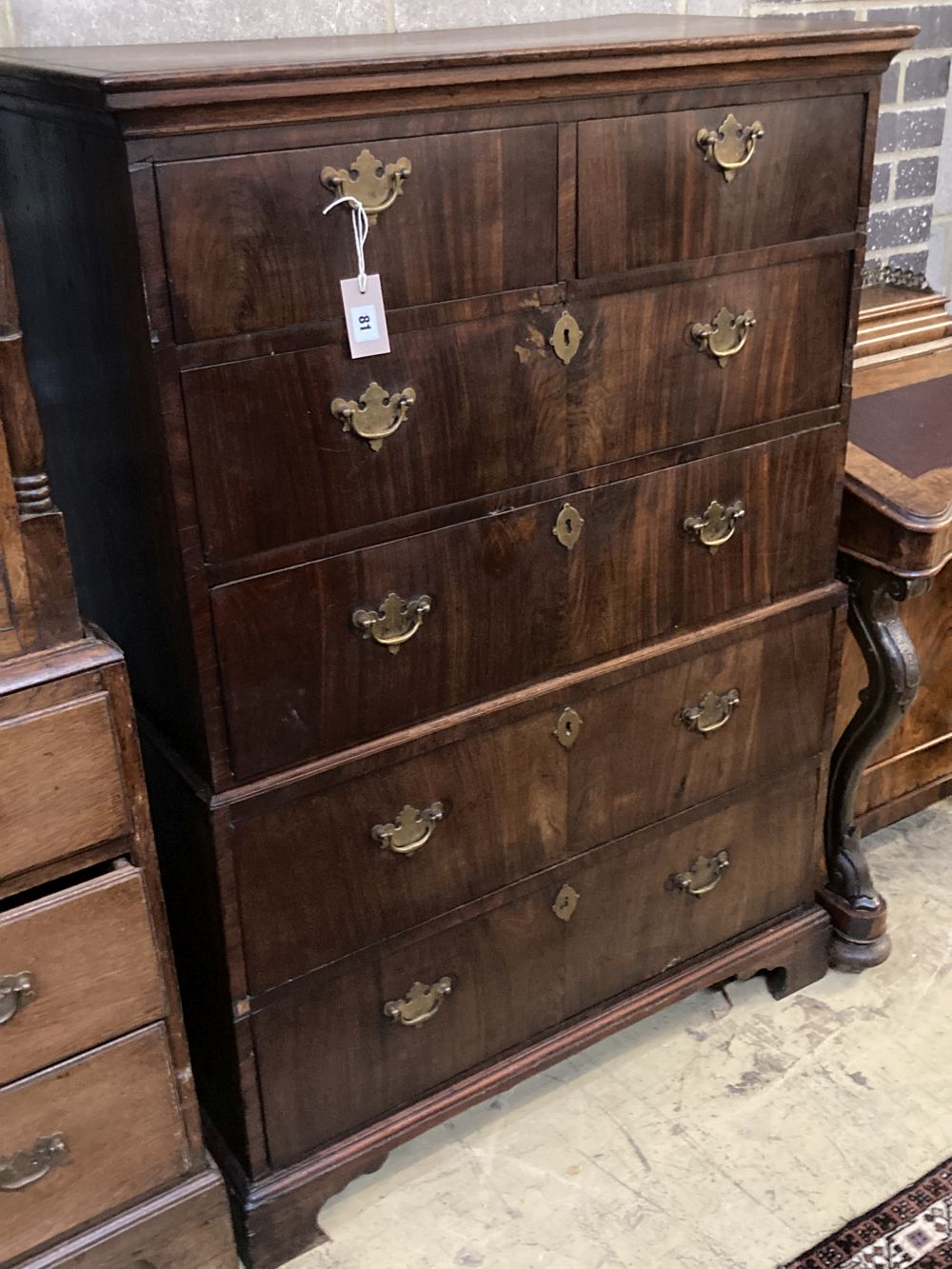 An 18th century oak and walnut chest on chest, width 92cm depth 47cm height 130cm